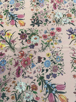 vintage botanical floral print fabric with colorful flowers on cream background