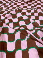 Vintage fabric with pink and brown wave pattern and green outlines, 60s retro style design, 150cm wide textile for sewing and home decor projects