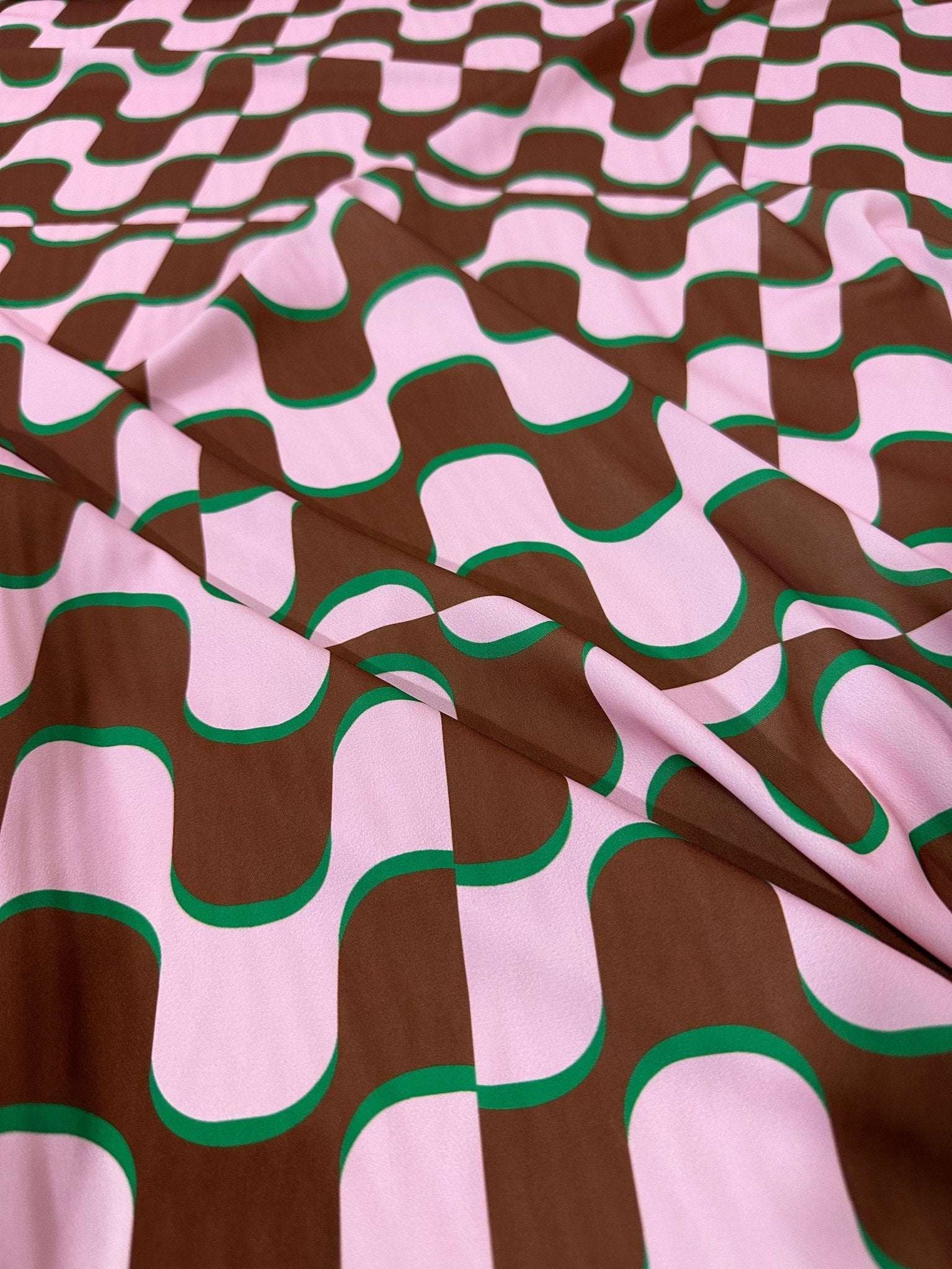 Vintage fabric with pink and brown wave pattern and green outlines, 60s retro style design, 150cm wide textile for sewing and home decor projects