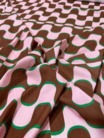 Vintage fabric with pink and brown wave pattern inspired by 60s and 70s style