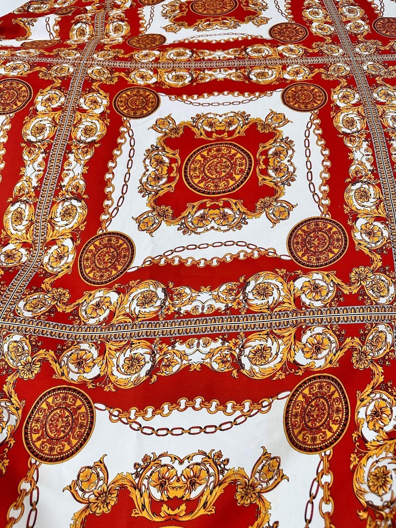 Vintage Baroque pattern fabric with gold and red ornate upholstery textile design