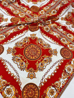red and gold vintage baroque pattern fabric with intricate ornate design and chain motifs