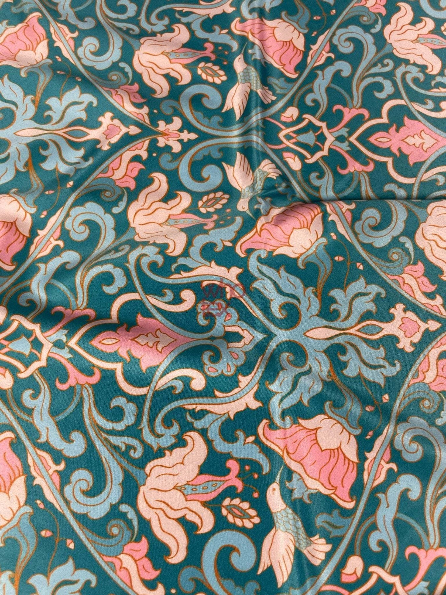 Vintage-inspired floral fabric with pink flowers and birds on teal background