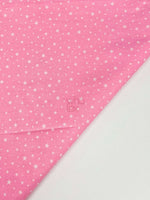White Stars Pink Poplin fabric 100% cotton with white star pattern on pink background, suitable for sewing and crafts