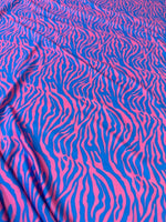 Blue and pink zebra pattern fabric with vibrant exotic animal print, 150cm wide, perfect for sewing and crafting projects