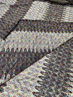 Black and white zigzag knit jersey fabric with luxury Italian chevron pattern and soft stretchy texture