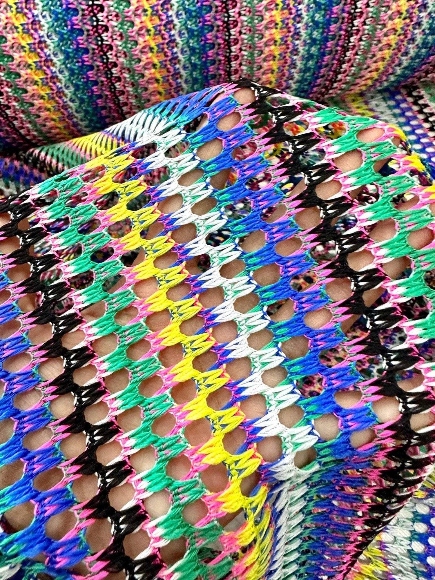 multicolor chevron zigzag knit jersey fabric with vibrant open knit pattern