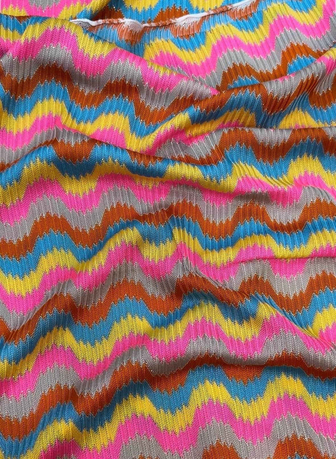 Luxury zigzag knit jersey fabric with pink and blue chevron design, soft and stretchy for sewing projects