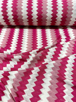 Luxury zigzag knit jersey fabric in pink and white chevron pattern with soft texture and 150 cm width