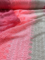 Pink and white chevron zigzag knit jersey fabric with textured pattern