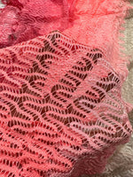Pink and white chevron zigzag knit jersey fabric with textured pattern