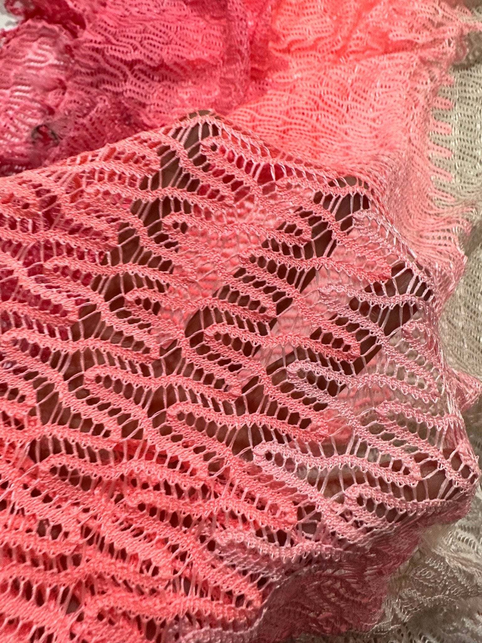 Pink and white chevron zigzag knit jersey fabric with textured pattern