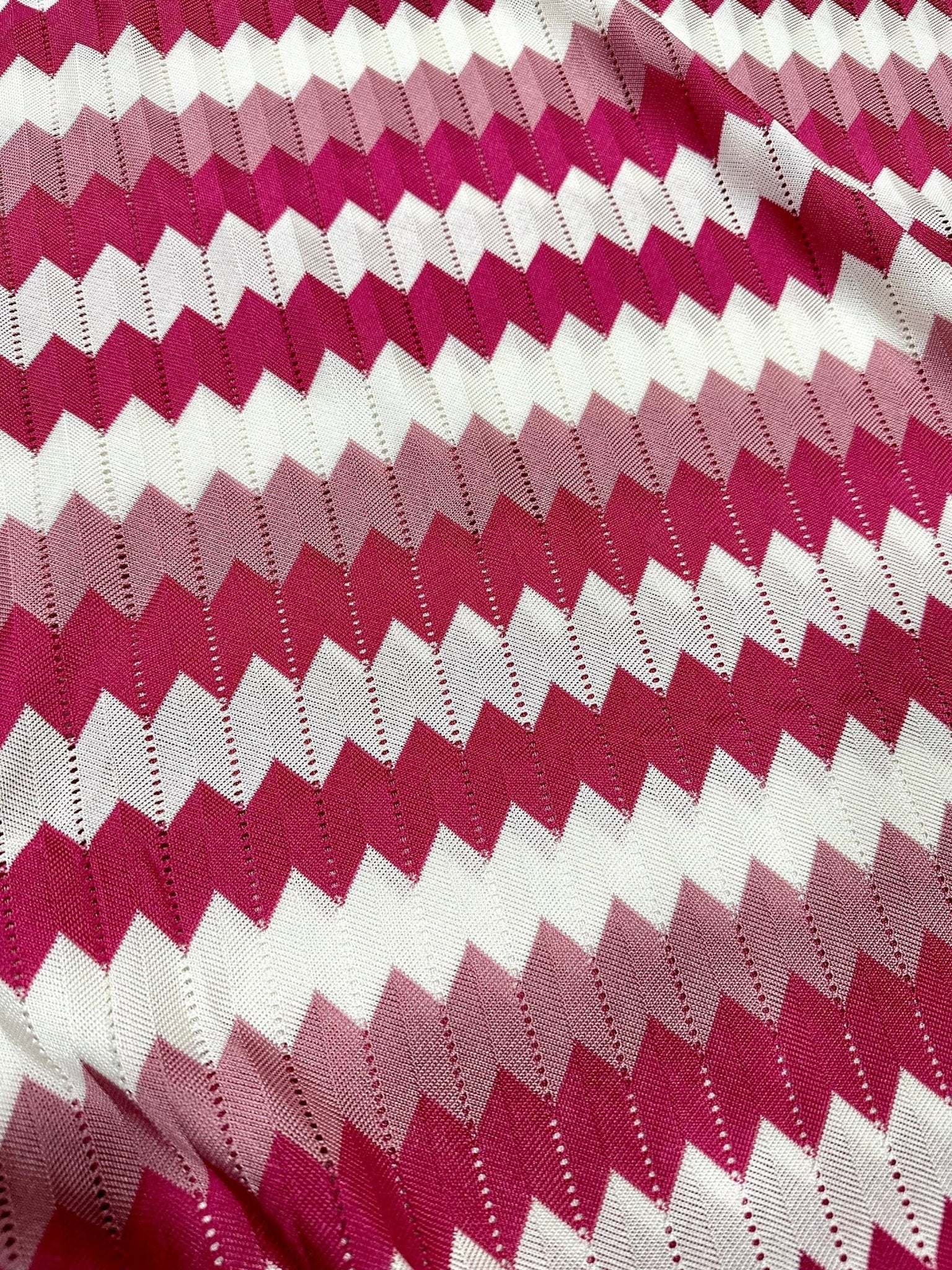 Pink and white luxury zigzag knit jersey fabric with chevron pattern and soft texture