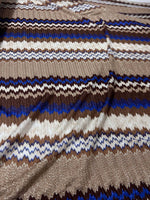 Shimmering brown zigzag knit mesh fabric with elastic jersey stretch for fashion apparel