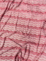 Pink tones zigzag mesh fabric with textured knit pattern and 150 cm width for sewing projects