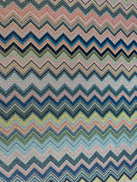Colorful zigzag knit fabric with gold Lurex thread and textured polyester blend