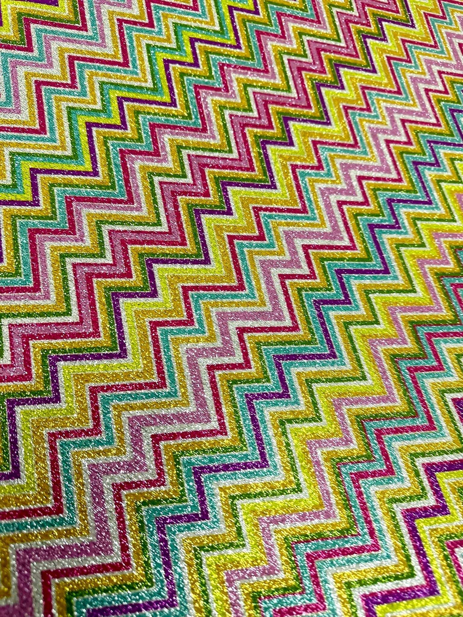 Multicolor shimmer zigzag knit fabric with gold Lurex finish and vibrant polyester texture